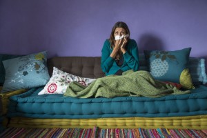 Woman suffering from allergens in her home